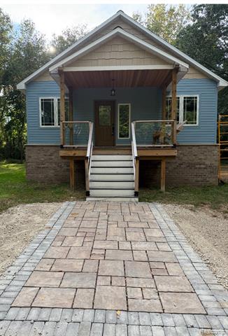 front view picture of 6100 Clear Lake Road, Grass Lake, MI. 49240
