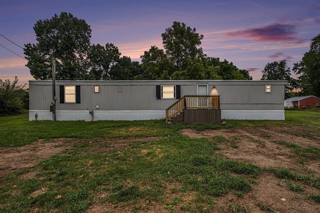 front view picture of 630 W Long Lake Road, Orleans, MI. 48865