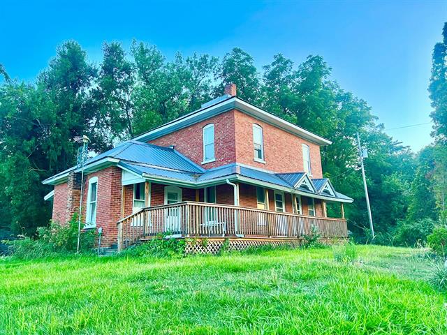 front view picture of 6571 Buckeye Road, Camden, MI. 49232