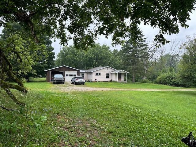 front view picture of 3819 Mckinney Road, Central Lake, MI. 49622