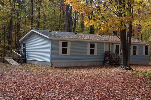 front view picture of 7142 Co Road 612 Ne, Kalkaska, MI. 49646