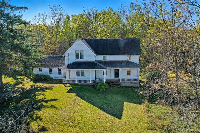 front view picture of 1765 W Fleck Road, Six Lakes, MI. 48886