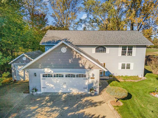 front view picture of 1057 Crown Point Drive, Weidman, MI. 48893