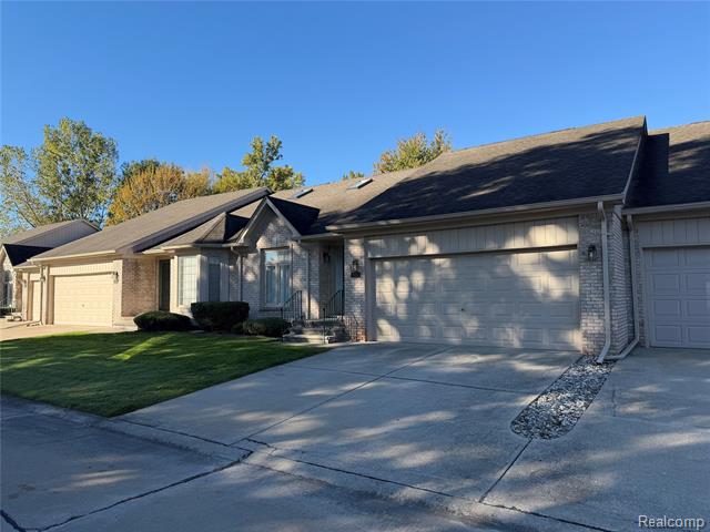 front view picture of 35251 Kings Forest Boulevard, Clinton Township, MI. 48035