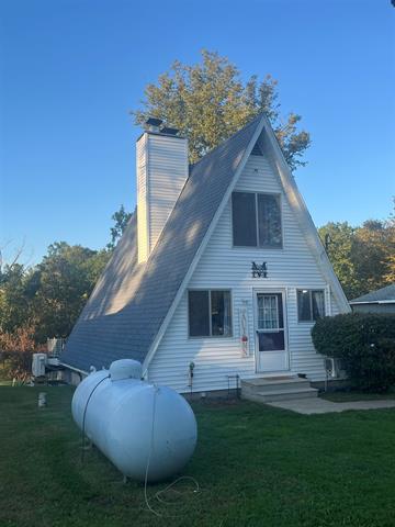 front view picture of 1053 Radov Road, Gladwin, MI. 48624