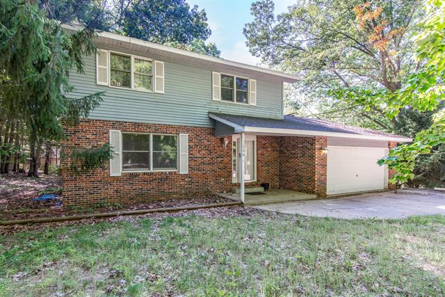 front view picture of 110 Carpenter Boulevard, Roscommon, MI. 48653