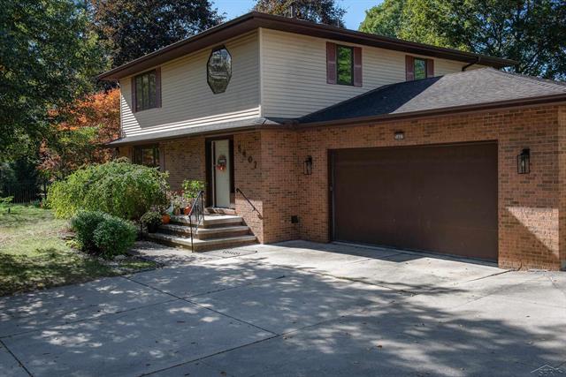 front view picture of 5407 Wanetah Drive, Midland, MI. 48640