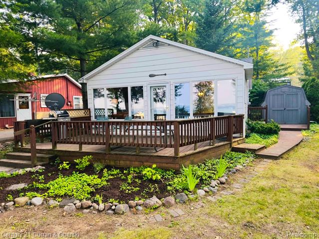 front view picture of 2744 W Higgins Lake Drive, Roscommon, MI. 48653