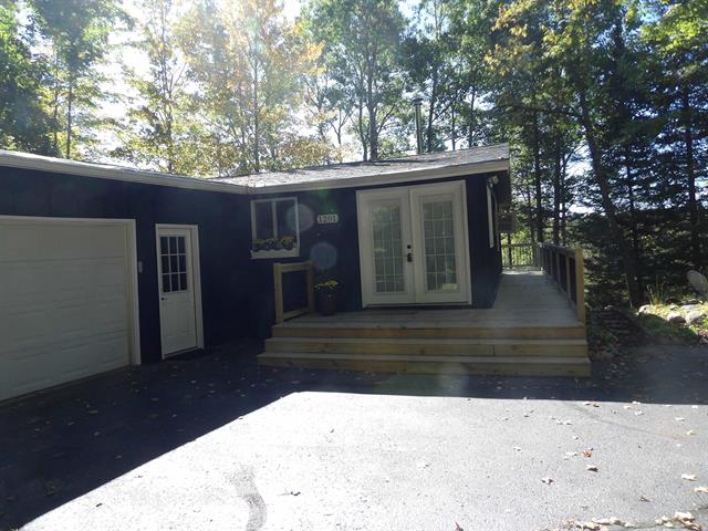 front view picture of 1201 Cedar River Drive, Bellaire, MI. 49615