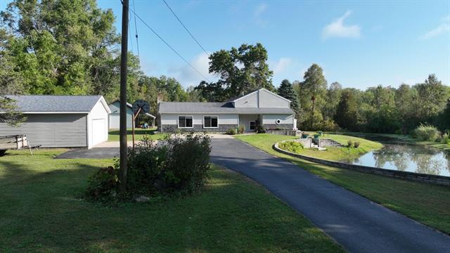 front view picture of 8757 Reiss Drive, Farwell, MI. 48622