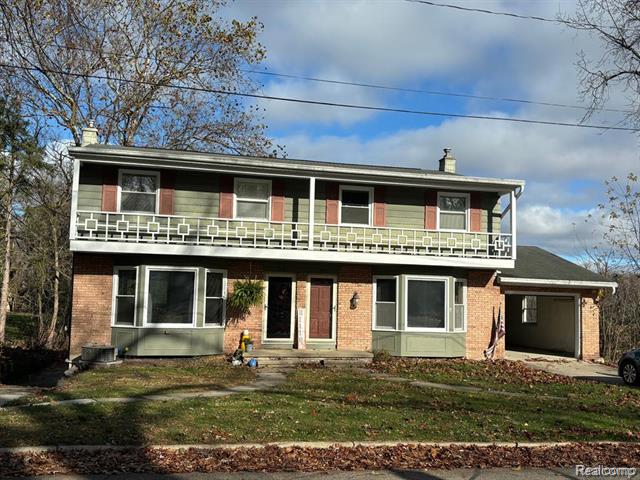 front view picture of 308 Bessemaur Drive, East Lansing, MI. 48823