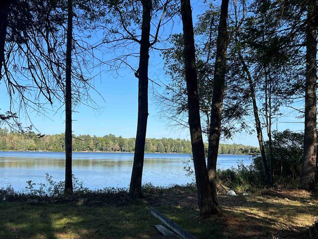 front view picture of 5532 Kerbysons Drive Se, Kalkaska, MI. 49646