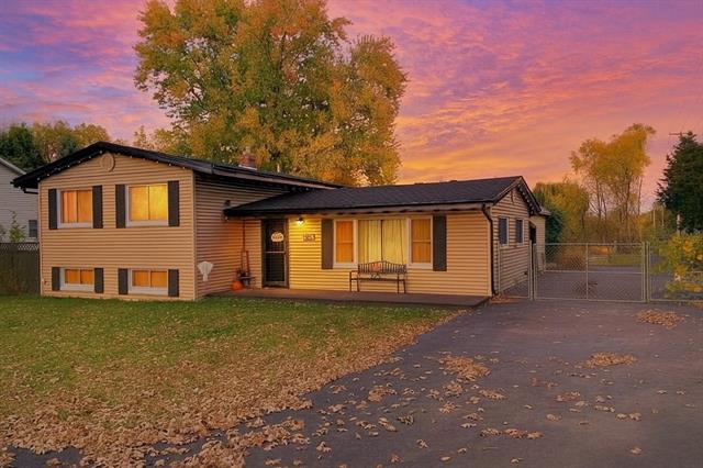 front view picture of 5016 Deland Road, Flushing, MI. 48433