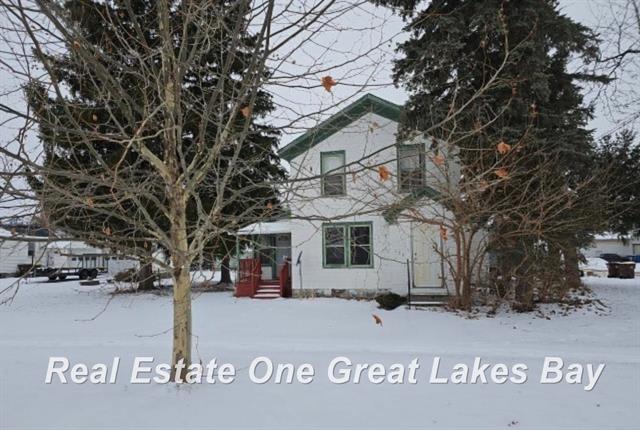 front view picture of 123 Clark Street, Chesaning, MI. 48616