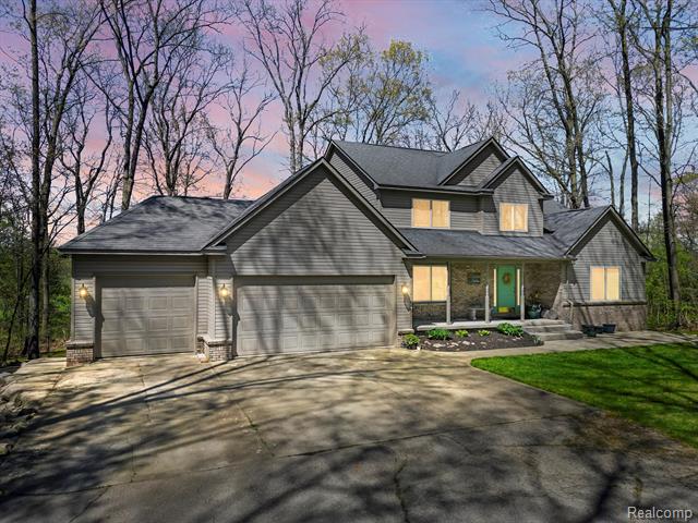 front view picture of 7111 Tucker Rd, Holly, MI. 48442