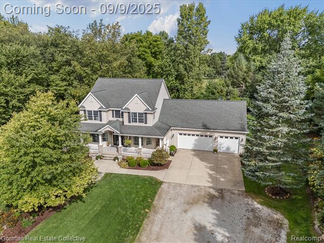 front view picture of 2480 Indianwood Rd, Lake Orion, MI. 48362