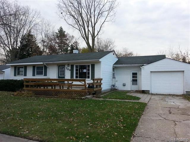 front view picture of 709 Richard St, Holly, MI. 48442