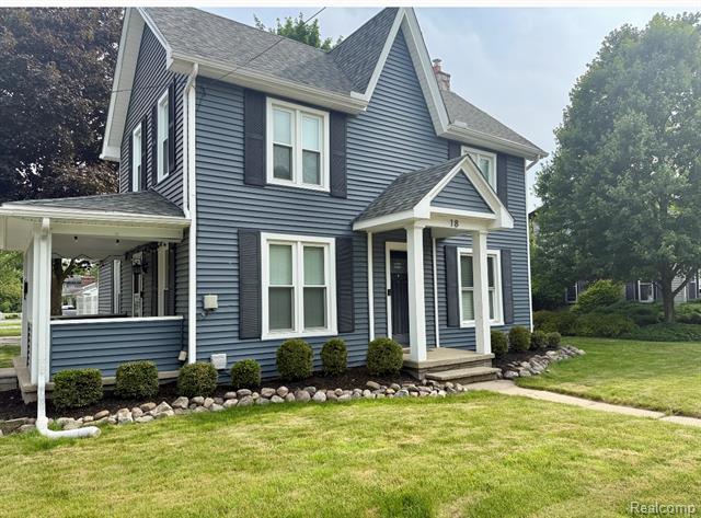 front view picture of 18 Park St, Oxford, MI. 48371