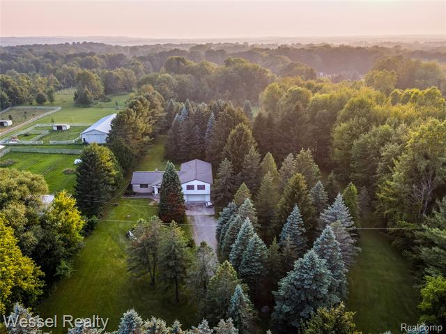 front view picture of 2465 Texter Rd, Leonard, MI. 48367