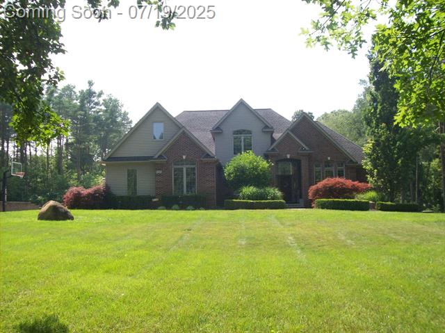 front view picture of 233 Faust Dr, Ortonville, MI. 48462