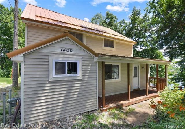 front view picture of 1400 Ora Rd, Oxford, MI. 48371