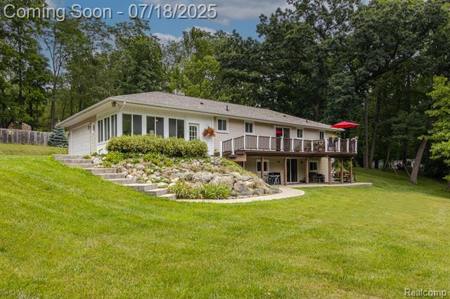 front view picture of 5074 Perryville Rd, Holly, MI. 48442