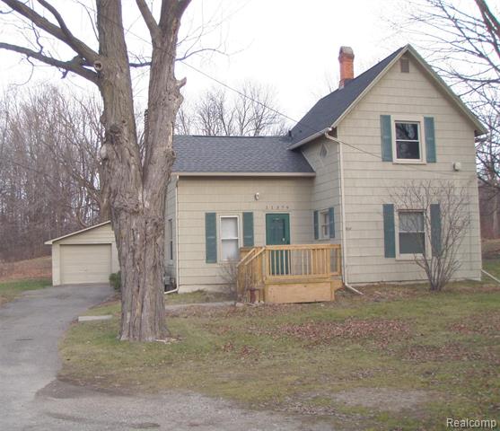 front view picture of 11379 Dixie Hwy, Holly, MI. 48442