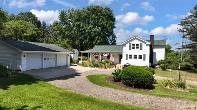 front view picture of 371 N Ortonville Rd, Ortonville, MI. 48462
