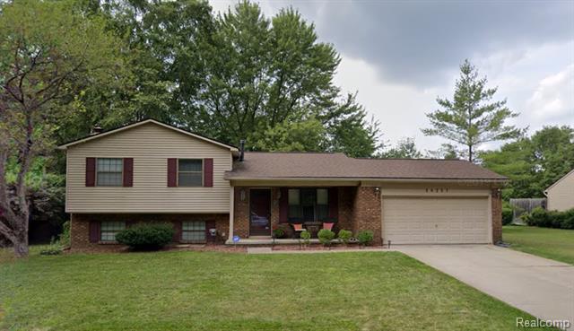 front view picture of 30207 Greening St, Farmington, MI. 48334