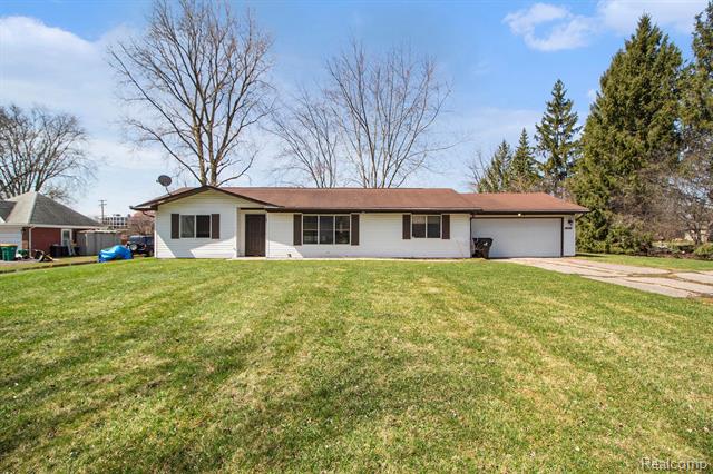 front view picture of 28531 Greening St, Farmington, MI. 48334