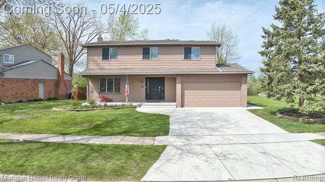 front view picture of 1901 Woodgate Dr, Troy, MI. 48083