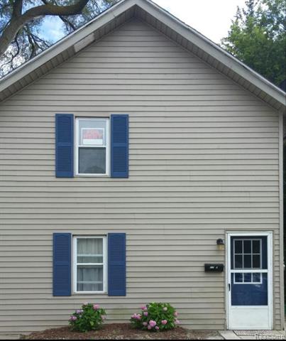 front view picture of 610 E Main Street, Flushing, MI. 48433