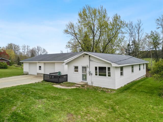 front view picture of 15065 21 Mile Road, Big Rapids, MI. 49307