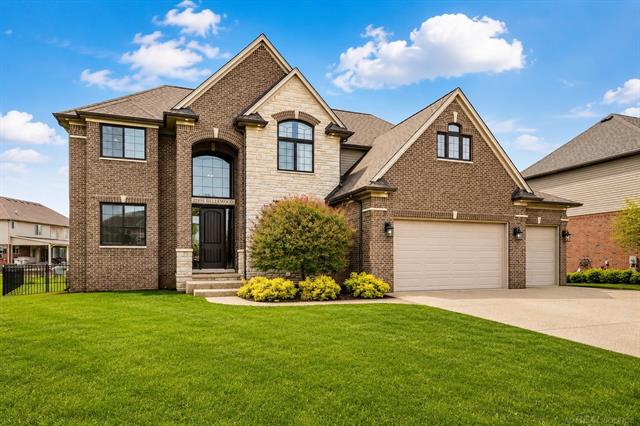 front view picture of 21936 Bellewood Drive, Macomb, MI. 48044