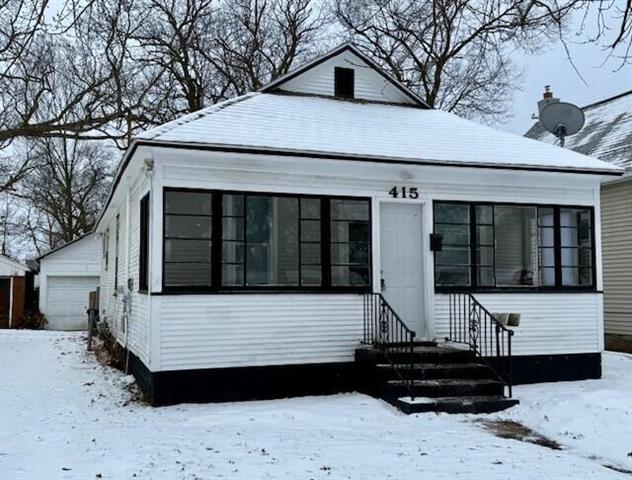 front view picture of 415 W Forest Avenue, Muskegon, MI. 49441