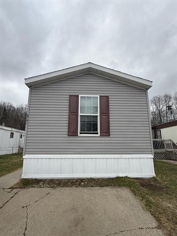 front view picture of 6741 Helman Boulevard, Lansing, MI. 48911