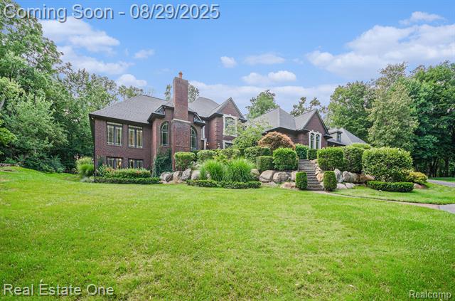 front view picture of 6040 N Rochester Rd, Rochester, MI. 48306