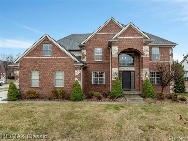 front view picture of 25345 Meadow Ct, South Lyon, MI. 48178