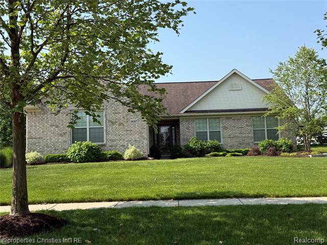 front view picture of 58307 Holland Dr, South Lyon, MI. 48178