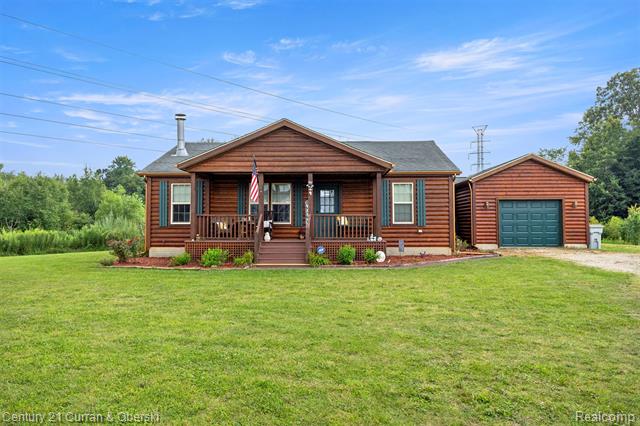 front view picture of 58539 Dolly Rd, South Lyon, MI. 48178