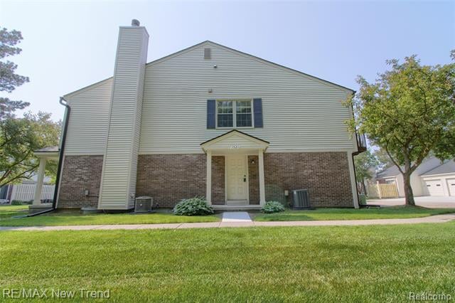 front view picture of 1521 Dover Hill Rd N, Walled Lake, MI. 48390