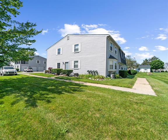 front view picture of 245 Lake Village Dr, Walled Lake, MI. 48390