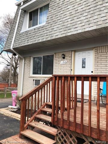 front view picture of 150 Ladd Rd, Walled Lake, MI. 48390