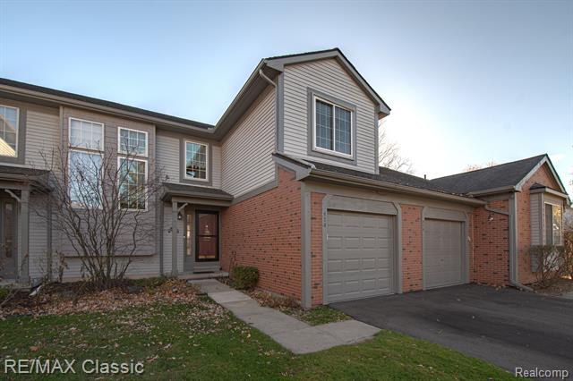 front view picture of 573 Winwood Ct, Walled Lake, MI. 48390