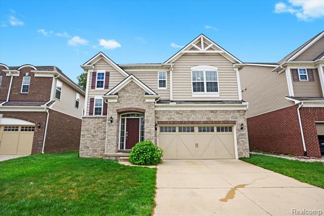front view picture of 49645 Hartwick Dr, Novi, MI. 48374