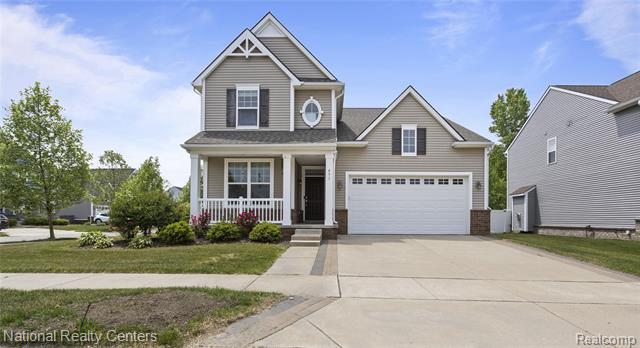 front view picture of 451 Goodrich St, Wixom, MI. 48393