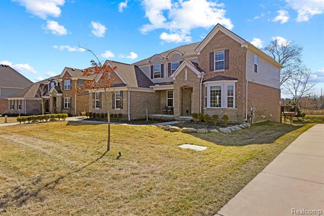 front view picture of 22797 Country Club Dr, South Lyon, MI. 48178
