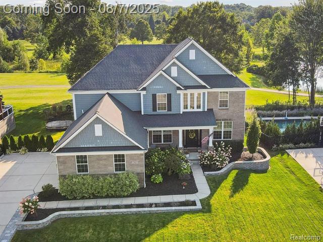 front view picture of 22821 Country Club Dr, South Lyon, MI. 48178