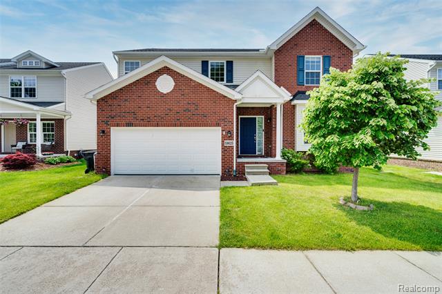front view picture of 59625 Twin Pines Dr, New Hudson, MI. 48165
