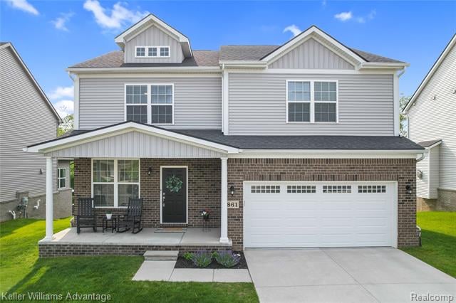 front view picture of 861 N Mill St, South Lyon, MI. 48178